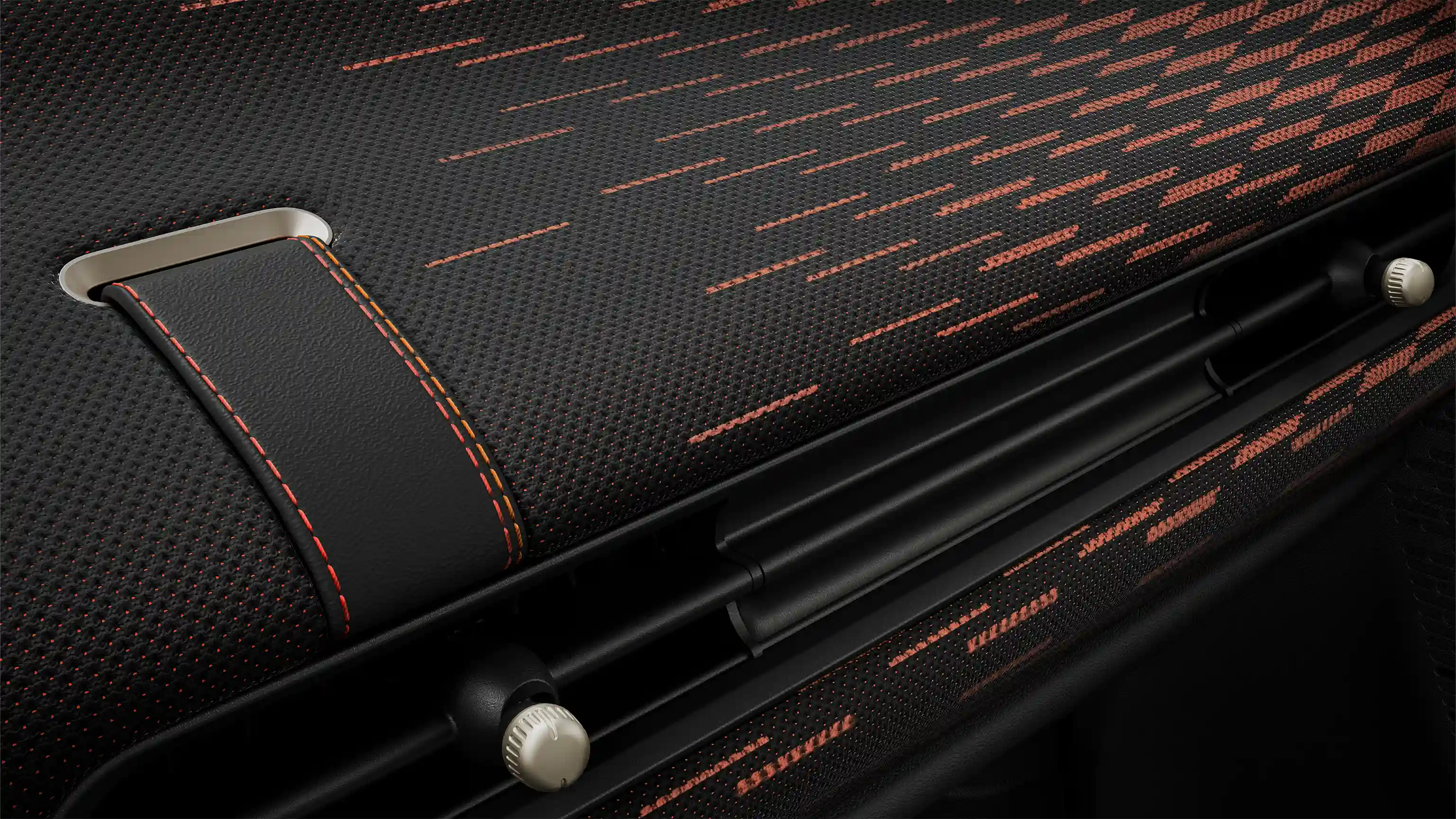 Zicht op het rood-zwarte dashboard van de MINI Cooper JCW uitvoering