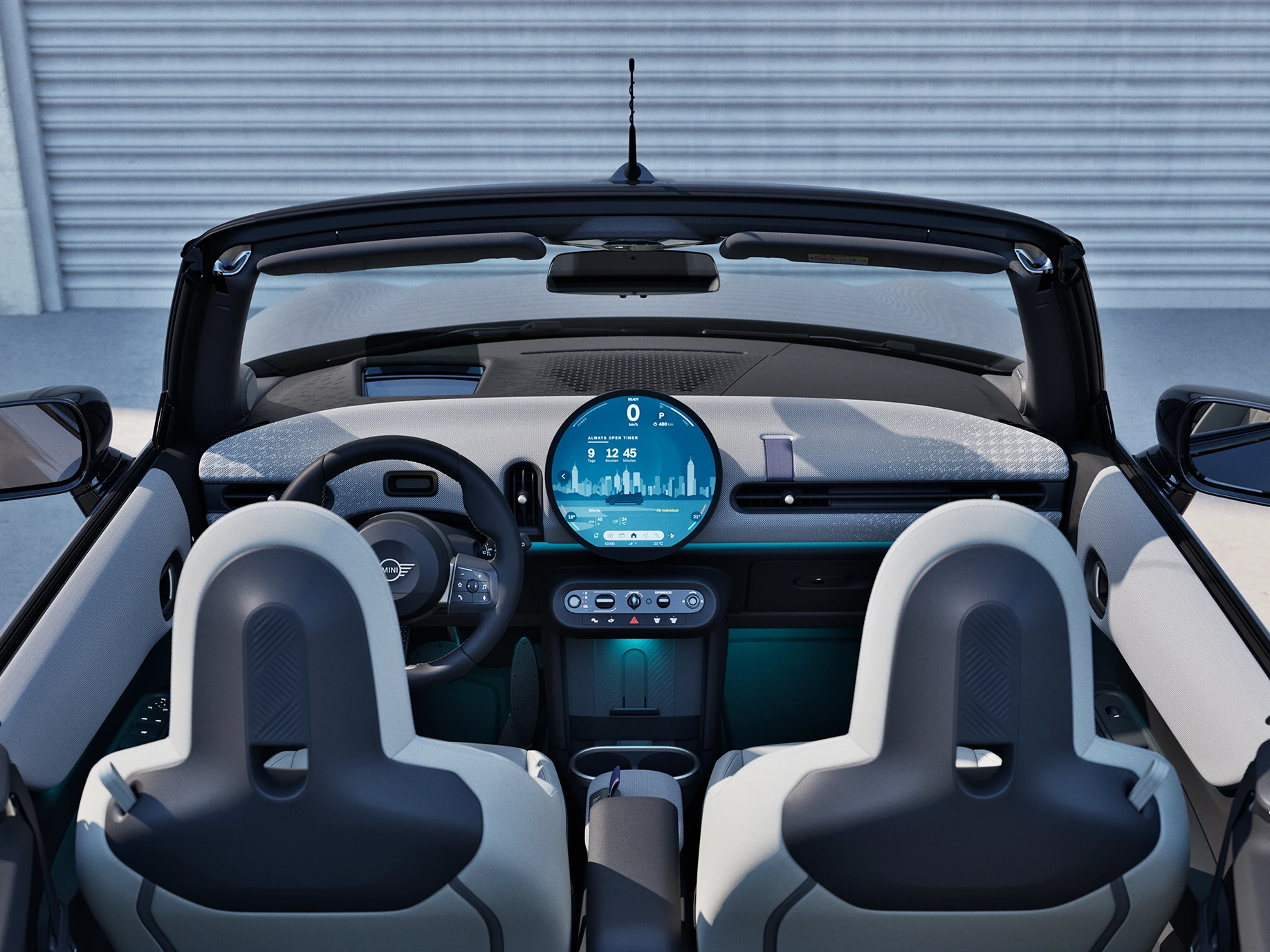 Achteraanzicht van het interieur van de MINI Cooper Cabrio met focus op het dashboard en de interactie-eenheid.