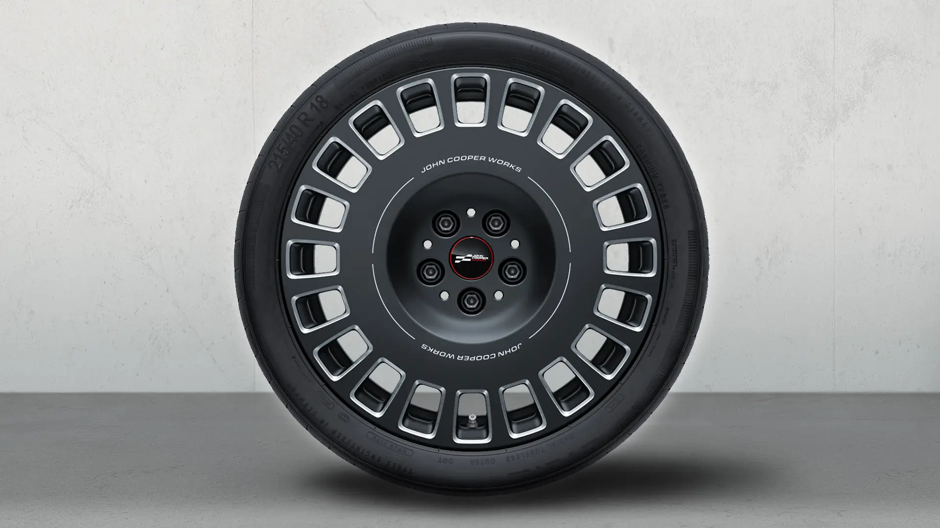 18 inch MINI JCW Rallye Spoke 964 wiel uitgevoerd in Frozen Midnight Grey/Diamond-Milled.