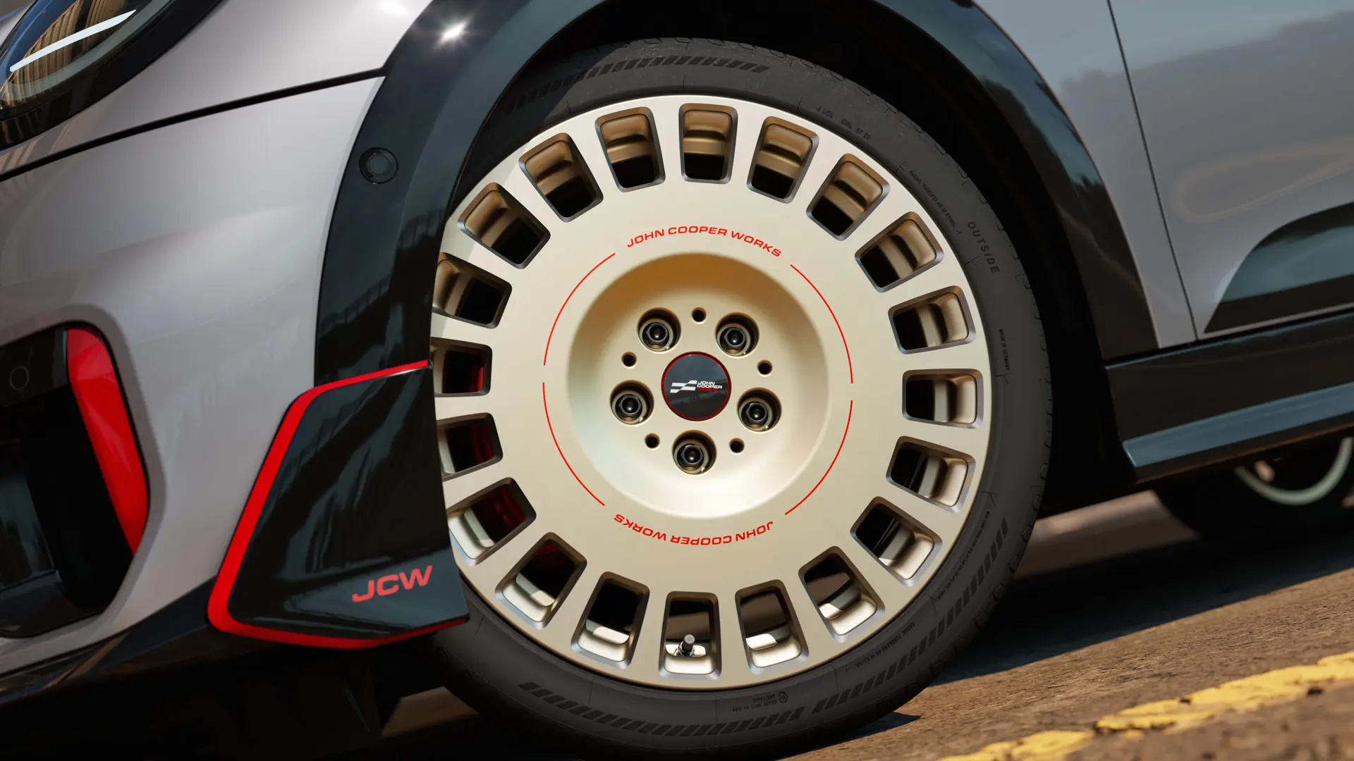 Close-up van een 18 inch JCW Rallye Spoke 964 wiel in Bicolour Vibrant Silver/Diamond-Milled met winglet voor.