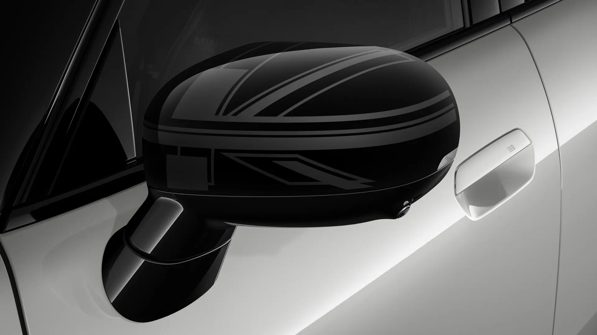 MINI Cooper 3-deurs in het zilver met buitenspiegelkappen met een Night Union Jack design.